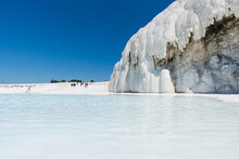 Natural Travertine Pools And Terraces In Pamukkale At Turkey.