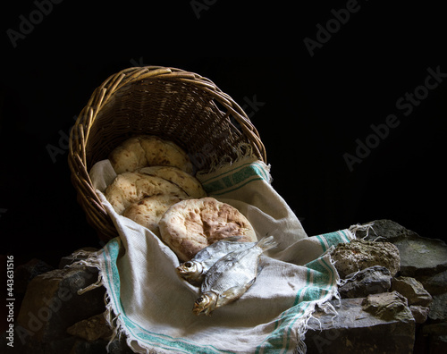 Five loaves and two fish in a basket