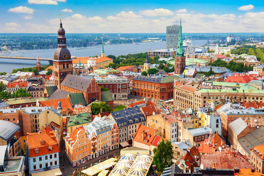 Wall Mural -  - Panoramic view of the old city of Riga, Latvia from the tower Church of St. Peter. Summer sunny day
