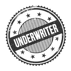 UNDERWRITER text written on black grungy round stamp.