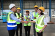 © sittinan - Business people shaking hands, finishing up a meeting ,  wholesale, logistic, people and export concept - manual worker and businessmen with clipboard shaking hands and making deal at warehouse