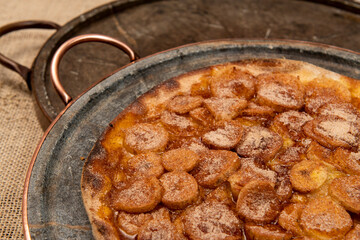 Sweet Brazilian pizza with banana, cinnamon and sugar