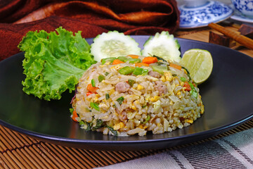 Yangzhou fried rice. Yangzhou fried rice is a popular Chinese-style wok fried rice dish in many Chinese restaurants throughout the world