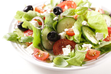 Wall Mural - vegetable salad with cucumber,  tomato and olive