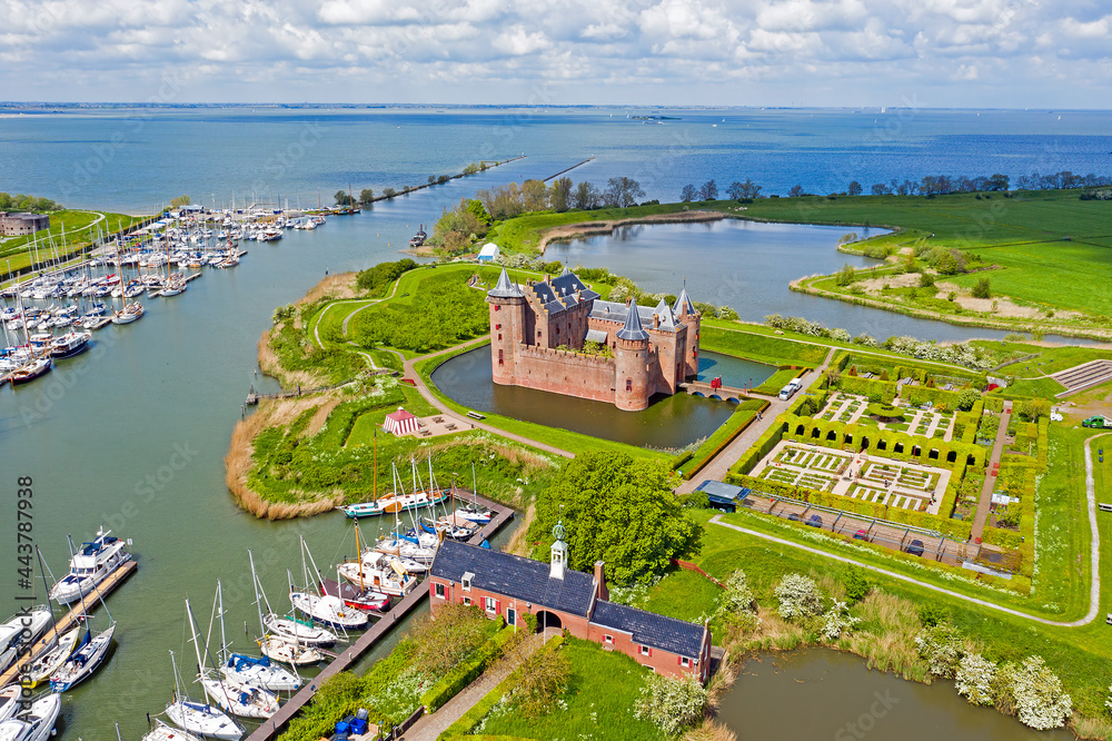 Aerial from the medieval Muiderslot castle at the IJsselmeer in the Netherlands - obrazy, fototapety, plakaty 