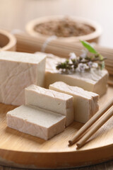 Wall Mural - Fresh Tofu on wooden cutting board, Food ingredient in Asian cuisine