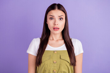 Poster - Photo of unhappy upset sad shocked scared woman bad mood news fake isolated on purple color background