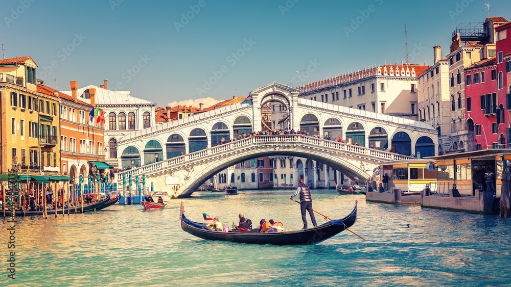 Gondola on Grand canal near Rialto bridgein Venice, Italy - obrazy, fototapety, plakaty 