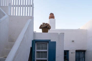 Wall Mural - Greece, Cyclades. Folegandros island, White building with blue windows