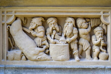 Bas Relief With Dwarves Depicting The Process Of Making Sausage