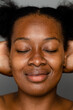 © McKinsey Jordan/Stocksy - Portrait Of Black Woman With Eyes Closed