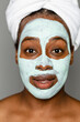 © McKinsey Jordan/Stocksy - Woman Wearing Clay Face Mask