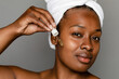 © McKinsey Jordan/Stocksy - Black Woman Using Applicator To Apply Facial Oil