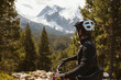 © Blue Collectors/Stocksy - Mountain biker into the high mountains