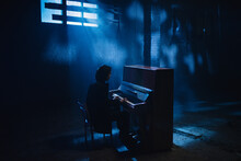 A Man Playing The Piano