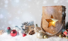 Composition With Wooden Christmas Lantern On Snow Against Light Grey Background