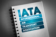 © dizain - IATA - International Air Transport Association acronym on notepad, concept background