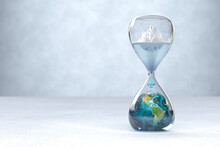 Earth Planet In Hourglass, Global Warming Concept