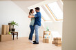 © littlewolf1989 - Happy young couple dancing and enjoying their very first day in new house.