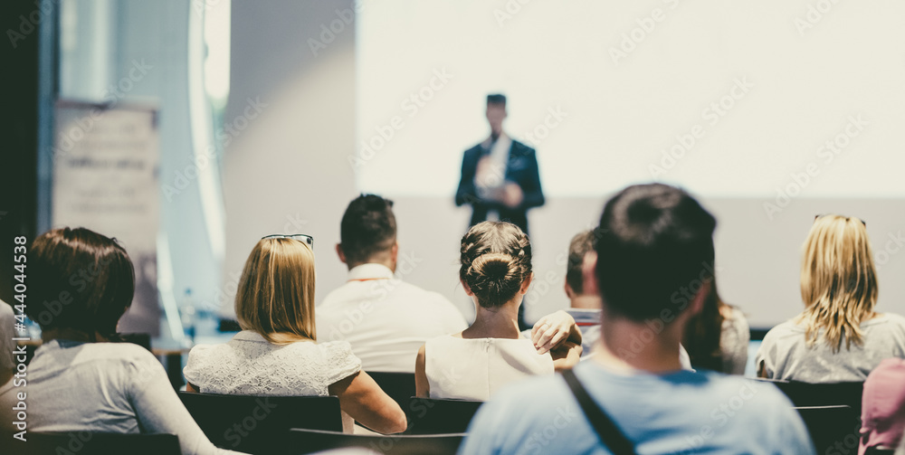 Male business speaker giving a talk at business conference event. - obrazy, fototapety, plakaty 