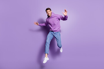 Aufkleber - Full length body size photo man jumping up cheerful overjoyed isolated pastel purple color background