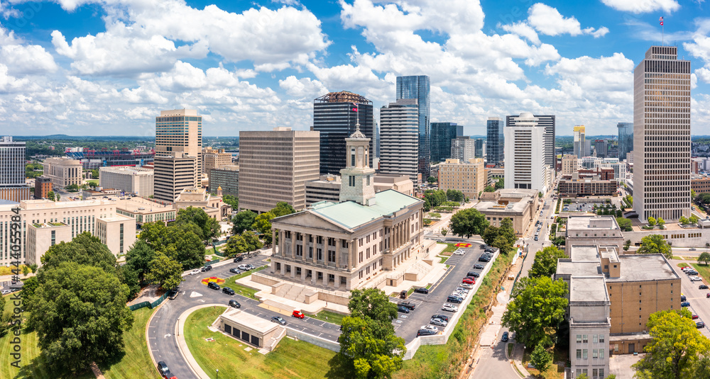Aerial view of Nashville Capitol and skyline on a sunny day. Nashville is the capital and most populous city of Tennessee, and a major center for the music industry - obrazy, fototapety, plakaty 
