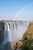 Fototapeta  - rainbow over Victoria Falls Zimbabwe