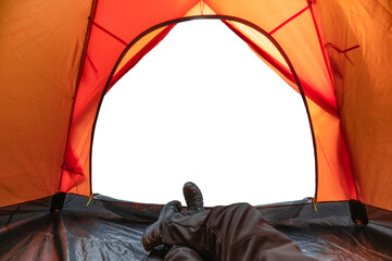 traveler man relaxing inside a orange tent