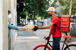 © Santi Nuñez/Stocksy - Woman Receiving a Package
