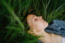 Woman In Green Grass