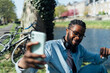 © Mattia/Stocksy - Black Man doing a Videocall Outdoor