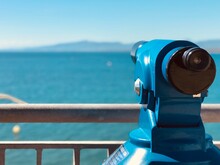 Close-up Of Coin-operated Binoculars Against Sea