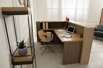 Wall Mural - Receptionist's workplace with laptop in hotel. Interior design