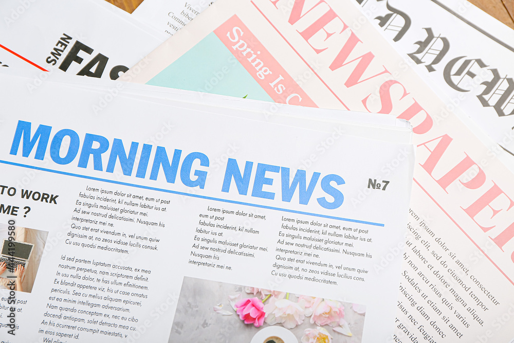 Many newspapers as background, closeup