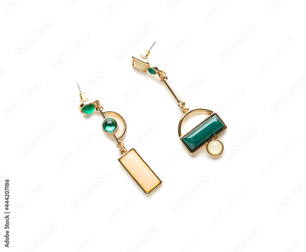 Beautiful earrings on white background