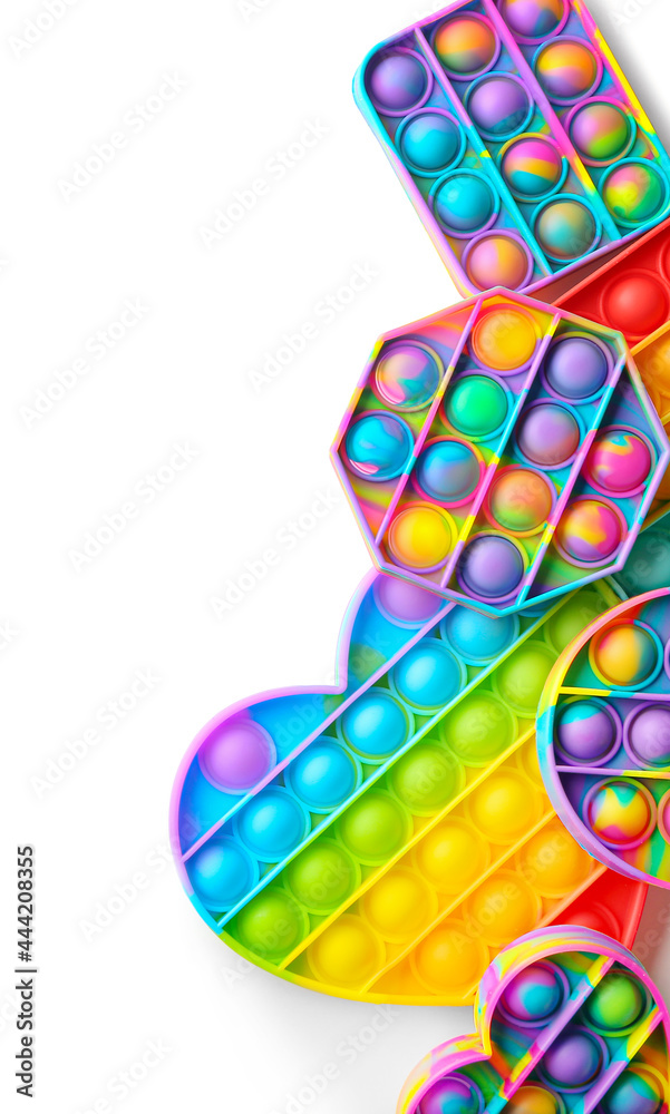 Bright fidget toys on white background