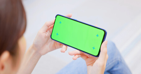 Sticker - woman with green screen smartphone