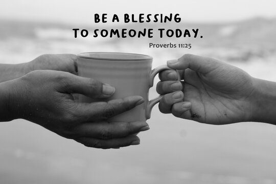 Wall Mural -  - Bible verse quote - Be a blessing to someone today. Proverbs 11:25. With hands of two people holding a cup of coffee in black and white abstract art background. Kindness and giving concept.