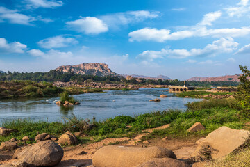 Wall Mural - Ancient Vijayanagara Empire civilization ruins near Tungabhadra river, Hampi, Karnataka, India