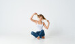 © SHOTPRIME STUDIO - woman sitting on the floor posing fashion stylish hairstyle lifestyle