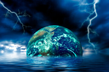 Wall Mural - planet Earth half into water and dramatic stormy sky, Earth day, our planet in danger concept