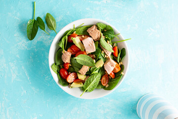 Poster - Tuna and spinach salad healthy food blue background