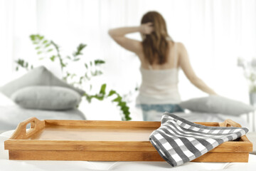 Wall Mural - Brown wooden tray of free space for your deocration and slim young woman with window 