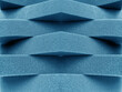 blue foam material arranged transversely. overlapping pile