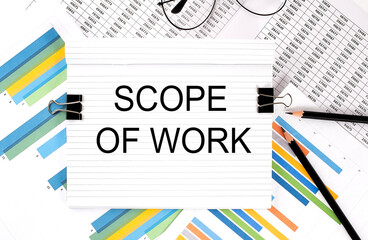 Poster - Notebook with pencils, glasses on graph background, with text SCOPE OF WORK
