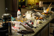 © SuperStock - Detail of messy kitchen counter after making blueberry pancakes