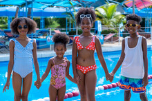 Children Playing In The Water Park. An African American Girl Smiling.
