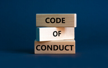 code of conduct symbol. concept words 'code of conduct' on wooden blocks on a beautiful grey backgro