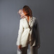 Fashion portrait with the effect of blurring in motion at a long shutter speed,