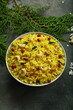 Poha, delicious Indian vegetarian meal made with organic flattened rice flakes and spices.
